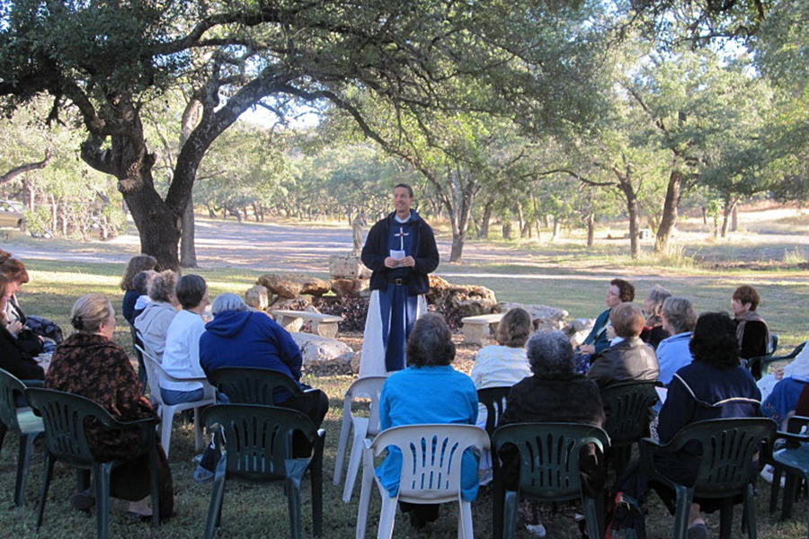 FATHER ADDRESSES EARLY RETREAT GROUP